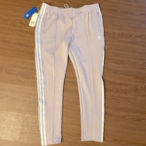 Brand new! ADIDAS lavender joggers, never worn. Size large.